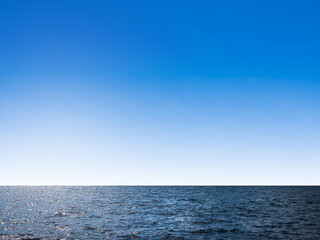 Obraz premium Sea ocean texture blue water nature with blue sky background, abstract shore clean calm natural summer for tourism travel in holidays, island deep surface.