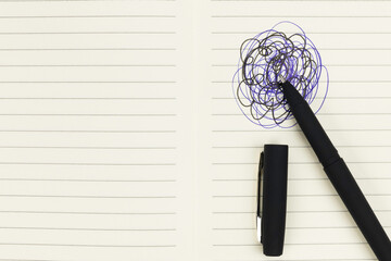 Notebook with handwritten change concept and pen.