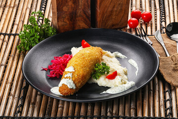 Chicken Kiev cutlet with puree