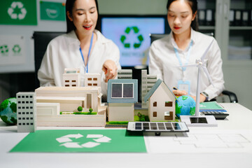 Business team people planning hand using laptop for working technology and business Net zero and...