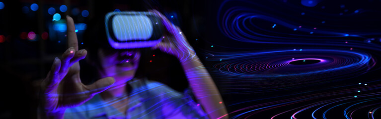 Person wearing VR headset with neon digital interface