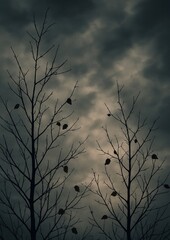 Obraz premium Eerie silhouette trees against sky.