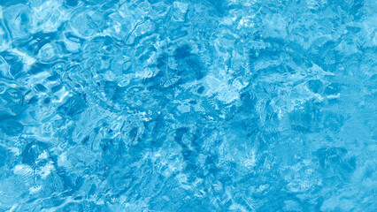 Top view blue water with ripple texture surface background, Blue water waves with shining pattern...