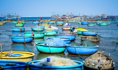 Colorful basket boats in a fishing village in Phan Rang, Vietnam.