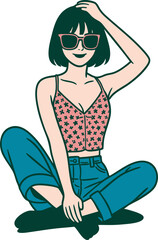 Young woman with short dark hair, wearing a star-print crop top, sunglasses, and blue jeans, sitting cross-legged with her hand on her head