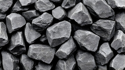 Pile of rough gray rocks and stones in various shapes and sizes