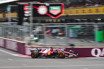 Naklejka premium BAKU, AZERBAIJAN - SEPTEMBER 21, 2025: Charles Leclerc drives the Scuderia Ferrari HP SF-25 during the Formula 1 Azerbaijan Grand Prix at Baku City Circuit
