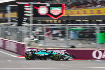 Naklejka premium BAKU, AZERBAIJAN - SEPTEMBER 21, 2025: Lance Stroll drives the Aston Martin Aramco AMR25 during the Formula 1 Azerbaijan Grand Prix