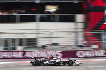 Naklejka premium BAKU, AZERBAIJAN - SEPTEMBER 21, 2025: Nico Hulkenberg piloting the MoneyGram Haas F1 Team VF-24 car during the Formula 1 Azerbaijan Grand Prix