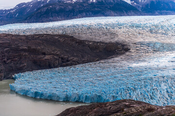 Impressive outlook on Grey Glacier from Paine Grande to Refugio Grey, along lake grey in Torres Del Paine national park, Patagonia, Chile.
