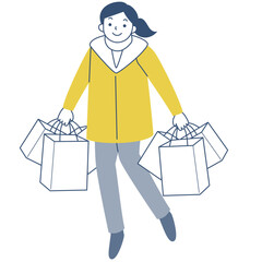 多数のショッピングバッグを持って歩く若い女性