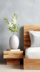 Peaceful bedroom corner with wooden nightstand, ceramic vase and fresh branches beside a bed, soft natural light, minimalist Scandinavian decor for calm lifestyle, copy space.