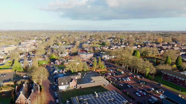 Forward-moving view outside a shopping mall area in Eelde, Netherlands during the winter season of 2025. Neutral indoor environment with continuous forward motion and everyday atmosphere.