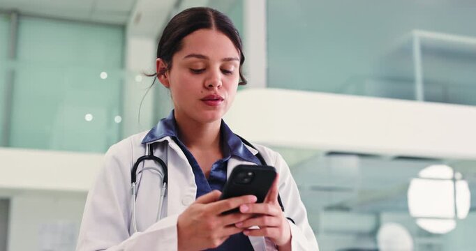 Doctor, woman and scroll in hospital with phone for schedule check, text message and medical update. Healthcare worker, person and walking in clinic with tech for patient email, research and agenda.