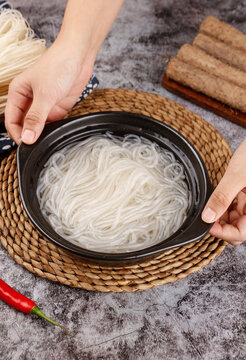 Handmade Asian Noodles in Black Bowl with Fresh Ingredients