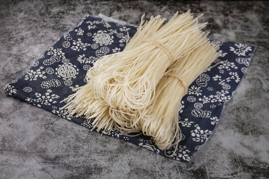 Handmade Dried Noodles on Traditional Asian Fabric