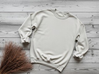 Minimalist light sweatshirt on rustic wooden background