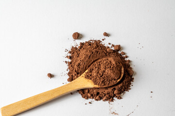 Natural Cocoa Powder On Spoon