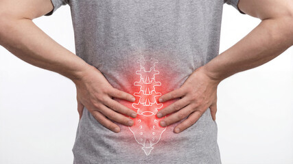 Person suffering from lower back pain, spine injury concept