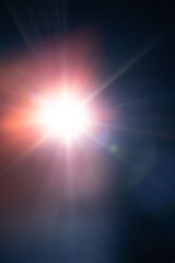 Blurred image Sun flare on the black background