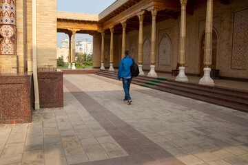 A tourist takes a photo of the Suzuk Ota complex, Uzbekistan, Toshkent.