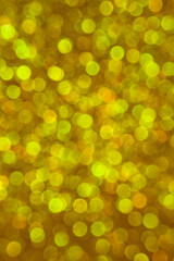 Abstract christmas lights glitter background. christmas gold texture background