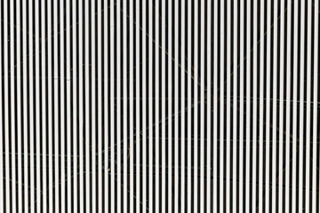 Abstract geometric background with vertical white lines creating repetitive pattern.