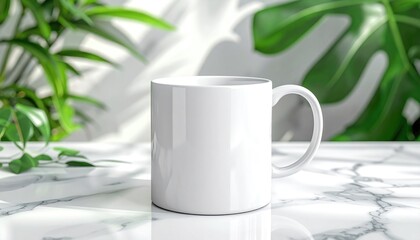 White mug on marble with plant backdrop