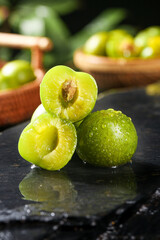 Fresh Green Sichuan Plums with Pit, Whole and Halved