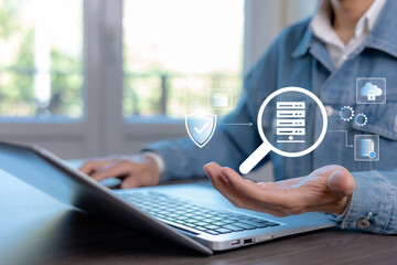 Digital document verification and data security concept with search, validation, and compliance icons. Professional working on laptop to manage secure information, audit processes, and modern data man