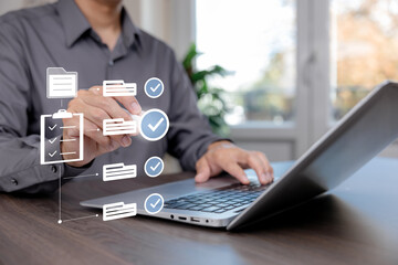 Business document workflow and checklist approval concept. Professional task management, verification, and quality control process using digital system on laptop in modern office environment.
