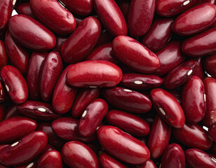 Gleaming red kidney beans fill the frame, close-up view