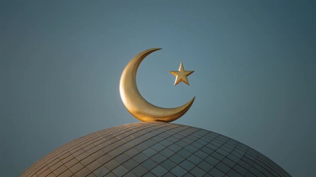 The Gleam of the Mosque Crescent. Islamic Culture &ndash; Idul Fitri. A large golden crescent moon and star emblem atop the main dome of a mosque, gleaming brightly in the early morning Eid sun.
