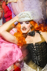 Dynamic Drag Queen Performing in Vibrant Costume at a Lively LGBTQ Event