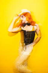 Drag Queen Performs Confidently on Stage at a Vibrant Cabaret Venue During an Exciting Event