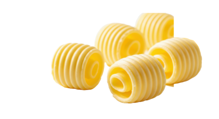Five golden yellow butter rosettes, ridged textures, glistening edges, on a white background with copy space, soft studio lighting, macro lens, appetizing gourmet food photography concept