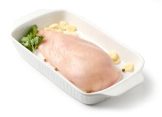 fresh chicken breast meat in cooking bowl