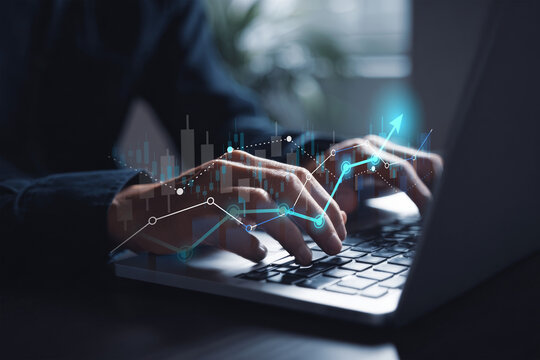 Person typing on a laptop keyboard, overlaid with vibrant digital financial charts and an upward trending line graph, symbolizing business growth, investment, and data-driven success. - Powered by Adobe