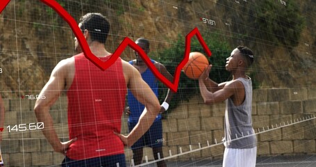 Holding basketball, man in gray tank preparing shot at outdoor court, red graph overlay, copy space