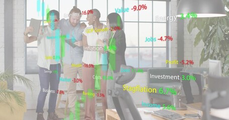 Viewing four colleagues in business casual studying AR financial charts on tablet in open office