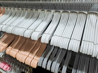 black plastic clothes hanger	