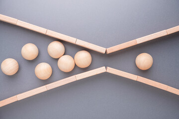 Business Bottleneck and Limited Flow Concept with Wooden Balls