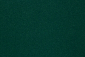 blank background: close up of dark green textured craft paper