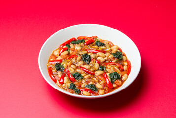 Vegetable stew with beans, spinach, peppers, tomatoes, and onions. Healthy eating. Vegetarian food.