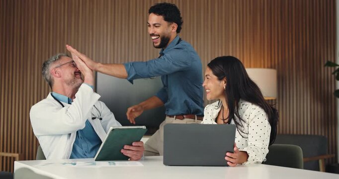 High five, doctors and group with laptop in office, medical journal publication and board approval. Healthcare, article release and happy people with celebration for achievement, computer and tablet