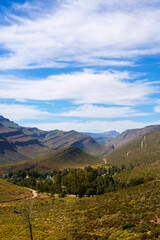 Majestic Cederberg Mountains tower over historic Wupperthal hamlet in South Africa&rsquo;s Western Cape&mdash;a serene mission village amongst dramatic rocky peaks, perfect for travel and landscape inspiration.