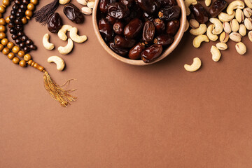 Ramadan kareem background with dates, cashews and pistachios