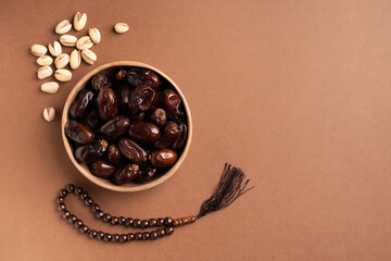 Ramadan kareem background with dates rosary