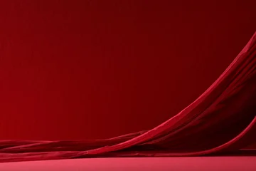 Fotobehang Rood paars Layers of red pleated cloth creating a textured landscape on a red surface.  © photoguns