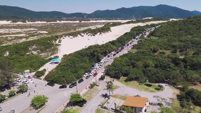 Joaquina beach congestion. Aerial view of the traffic jam on the Joaquina beach on the island of Santa Catarina, Florianopolis, Brazil